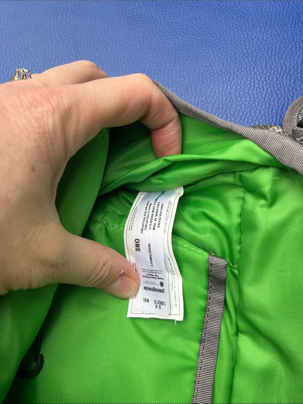 Patagonia’s Gray Messenger Bag with Green Accents older black hole